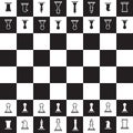 Chessboard with black and white oposite chess pieces Royalty Free Stock Photo