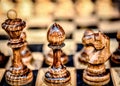 Chessboard with chess on a wooden bench.