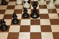 Chessboard and the chessmen as a game background Royalty Free Stock Photo
