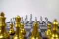 Chessboard close-up, matchup start of game, selective focus, white background Royalty Free Stock Photo