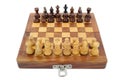 A chessboard with a full set of chess pieces focus on the white pieces Royalty Free Stock Photo