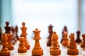 Chess board with pieces on it. Close up view with details, blurred background. Royalty Free Stock Photo