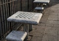 chessboard on a stone table in a public park (brooklyn new york city) chess board checkered squares Royalty Free Stock Photo