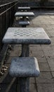 chessboard on a stone table in a public park (brooklyn new york city) chess board checkered squares Royalty Free Stock Photo