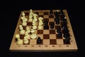 Chessboard under the pieces like a strategy theme Royalty Free Stock Photo