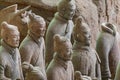 Chest closeup of soldiers in trench at Terracotta Army excavation hall, Xian, China