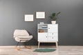 Chest of drawers in stylish living room Royalty Free Stock Photo