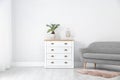 Chest of drawers in stylish living room