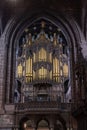 Close-up view of the church organ and pipes in the central nave of the historic Chester Cathedral in Cheshire Royalty Free Stock Photo