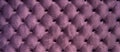 Chesterfield style quilted upholstery backdrop close up. Capitone pattern texture background Royalty Free Stock Photo