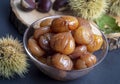 Chestnut dessert and chestnuts on a plate. Traditional delicious Turkish dessert chestnut candies (Kestane Sekeri