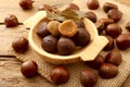Chestnut on rustic wooden table
