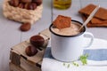 Chestnut soup in white enamel mug with roasted chestnuts Royalty Free Stock Photo