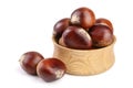 Chestnut in a wooden bowl isolated on white background. Top view