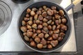 Chestnuts in the frying pan Royalty Free Stock Photo