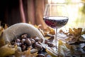 Chestnuts with glass of wine Royalty Free Stock Photo