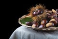 Chestnuts with leaves Royalty Free Stock Photo