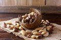 Chestnuts from Para or Brazil nuts, in Portuguese: Castanha-do-ParÃÂ¡ or Castanha-do-Brasil, in the bowl on a rustic wooden table Royalty Free Stock Photo