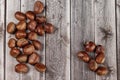 Chestnuts on wooden surface