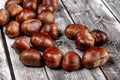 Chestnuts on wooden surface