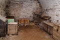 Chests and boxes in the basement of an old house