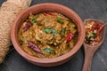 Spicy Indian chicken curry of Chettinad in clay pot