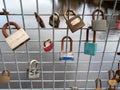 Love padlocks on a wire bridge Royalty Free Stock Photo