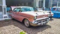 Surakarta Indonesia November 13 2021 pink Chevrolet Bel Air in a parking lot Royalty Free Stock Photo