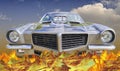 Chevrolet Camaro silver classic car front view with surreal environment of stylized wall of flames and cloudy sky Royalty Free Stock Photo