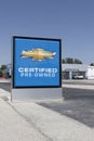 Chevrolet Certified Pre-Owned sign at a dealership. With supply issues, Chevy is selling pre-owned cars to meet demand