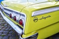 Chevrolet Impala rear end close up view, yellow painted classic american automobile Royalty Free Stock Photo