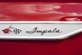 Chevrolet Logo on Red Chevy Impala Lowrider Classic Car Royalty Free Stock Photo