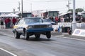 Chevrolet malibu making a start on the race track at the starting line