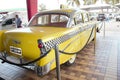Chevrolet 210: Rear view of car, sedan, year 1956, yellow color, taxi