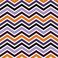 Chevron diagonal stripes background. Seamless pattern in Halloween traditional colors. Zigzag horizontal lines wallpaper Royalty Free Stock Photo