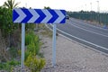 Chevron Road Sign On A Road Bend