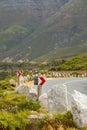 Chevron warning road sign for sharp hairpin bend on mountain pass Royalty Free Stock Photo