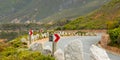 Chevron warning road sign for sharp hairpin bend on mountain pass