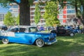 1955 Chevy Bel Air and classic cars parked outside for car show Royalty Free Stock Photo