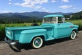1957 Chevrolet 3100 Pickup on country road Royalty Free Stock Photo