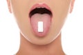 Chewing gum in the tongue of woman Royalty Free Stock Photo