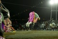 Chhau dance or Chhou dance of Purulia. Acrobatic male dancer vaulting in air.