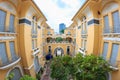 Ho Chi Minh city, Vietnam - December 2018: inner yard with green trees and cloudy sky in Ho Chi Minh city museum. Royalty Free Stock Photo