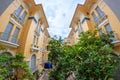 Ho Chi Minh city, Vietnam - December 2018: inner yard with green trees and cloudy sky in Ho Chi Minh city museum. Royalty Free Stock Photo