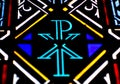 A Chi Rho symbol on a stained glass window Royalty Free Stock Photo