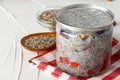 Chia pudding and raw chia seeds on white table Royalty Free Stock Photo