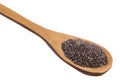 Chia Seed. Grains over wooden spoon, isolated white background. Royalty Free Stock Photo