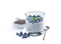 Chia seed pudding with blueberry in clear glass isolated on white Royalty Free Stock Photo