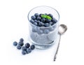 Chia seed pudding with blueberry in clear glass isolated on white Royalty Free Stock Photo