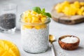 Chia seed pudding with mango cubes and coconut